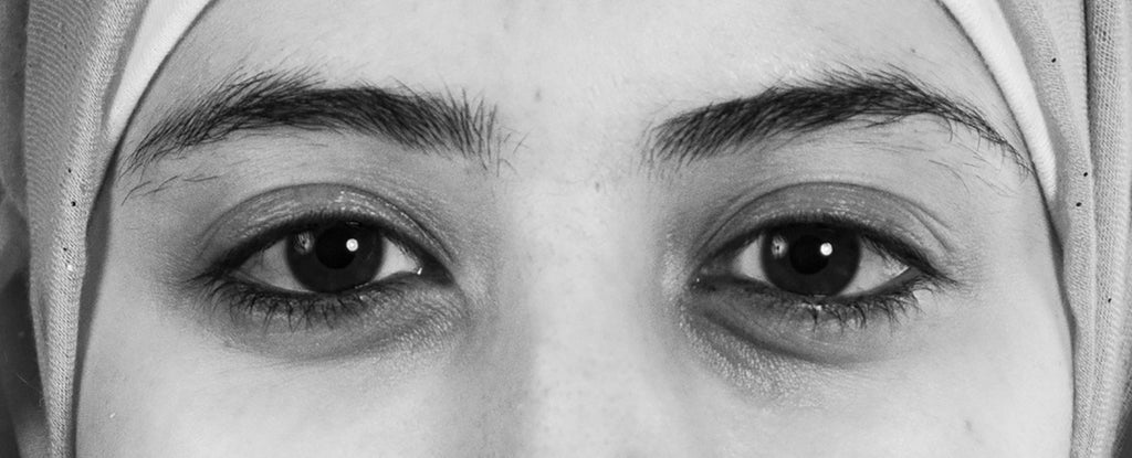 Black and white photo crop of woman's eyes